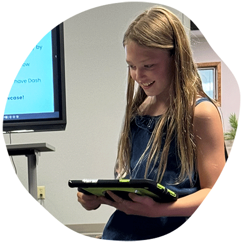 Smiling girl holding a tablet