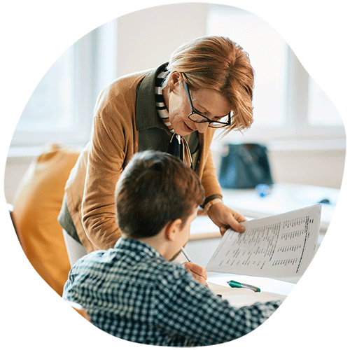 Female teacher helping a student
